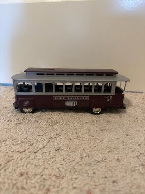 This item is a 1994 Ertl Hershey's Trolley Car Diecast Ban